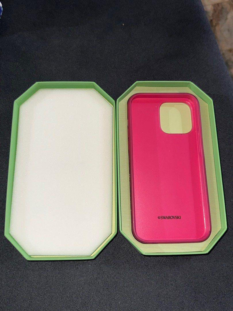 Pink Swarovski IPhone 14 Pro Max Case (Category: Cases & Sleeves) located in Quezon City. Submitted by kendra001 (Listing ID 1350686690, Image 3). Description: Pink Swarovski IPhone 14 Pro Max Case Used twice PM po for more photos Negotiable RFS: nagupgrade na po ng phone.