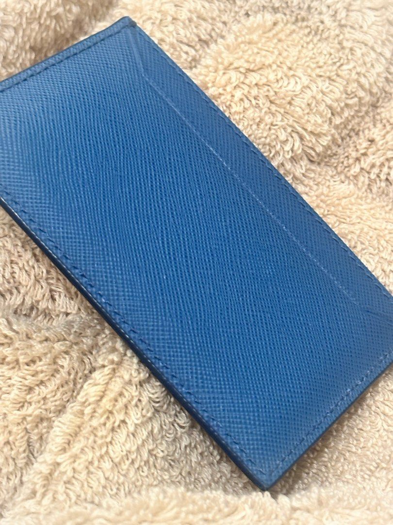 Prada Card Holder (Saffiano) Cobalt (Category: Luxury Bags & Wallets) located in Pasig City. Submitted by phaethrikh (Listing ID 1350679959, Image 3). Description: Authentic Prada Card Holder Material: Saffiano 1 Color: Cobalto Comes with Box and Purchase Card Shipping Fee c/o Buyer.