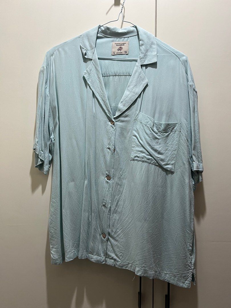Pull & Bear Button Down (Category: Shirts) located in Makati City. Submitted by clothesfrombel (Listing ID 1350595736, Image 1). Description: Selling Pull & Bear top with graphic detail at the back. Super slouchy, super oversized, super comfy. Perfect as a coverup at the beach..