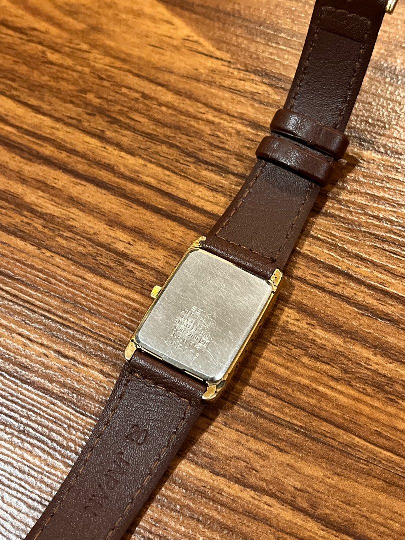 Seiko Tank (Category: Men's Watches) located in Pasig City. Submitted by ukaygodd (Listing ID 1350599163, Image 2). Description: 1984 Seiko Quartz 2G28-5010 . Gold tone dial, arabic numerals Gold plated case (small chipping off but still good, patina look) Aftermarket leather strap, Disassembled and cleaned. . 25mm x 35.5mm 18mm lug.