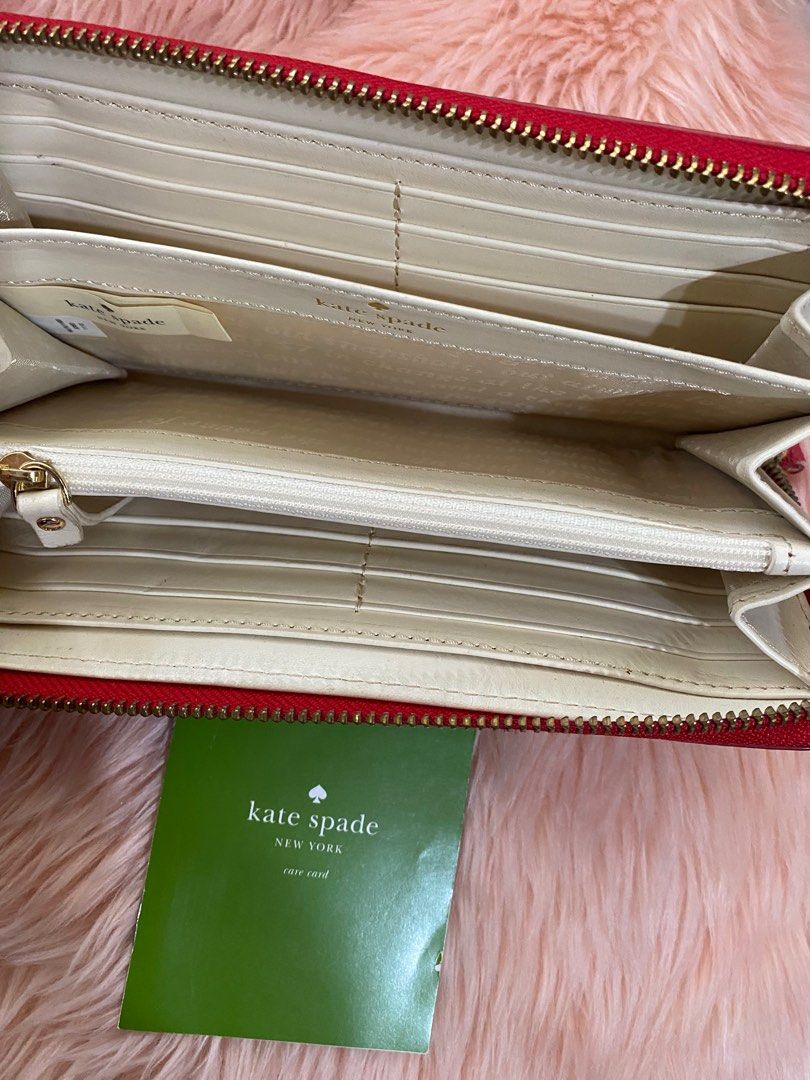 full zip wallet - Kate Spade ♠️ (Category: Luxury Bags & Wallets) located in Quezon City. Submitted by goodstuff_4sale (Listing ID 1350626621, Image 3). Description: Kate Spade full zip wallet just stored, never used no box red stipes Gcash Grab lalamove j&t jrs.