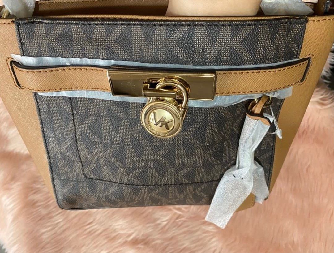 womens authentic MK hamilton messenger bag (Category: Luxury Bags & Wallets) located in Quezon City. Submitted by goodstuff_4sale (Listing ID 1350623079, Image 3). Description: 📌📌Sale price na po 📌NO return/ refund/ change if item 📌actual photos are posted new w tags original Michael Kors Hamilton traveller messenger bag brown / acorn zipper closure 10.5 x 7.5” adjustable straps 📌minor flaws - few scratches on metal hardware- see last 2 phot