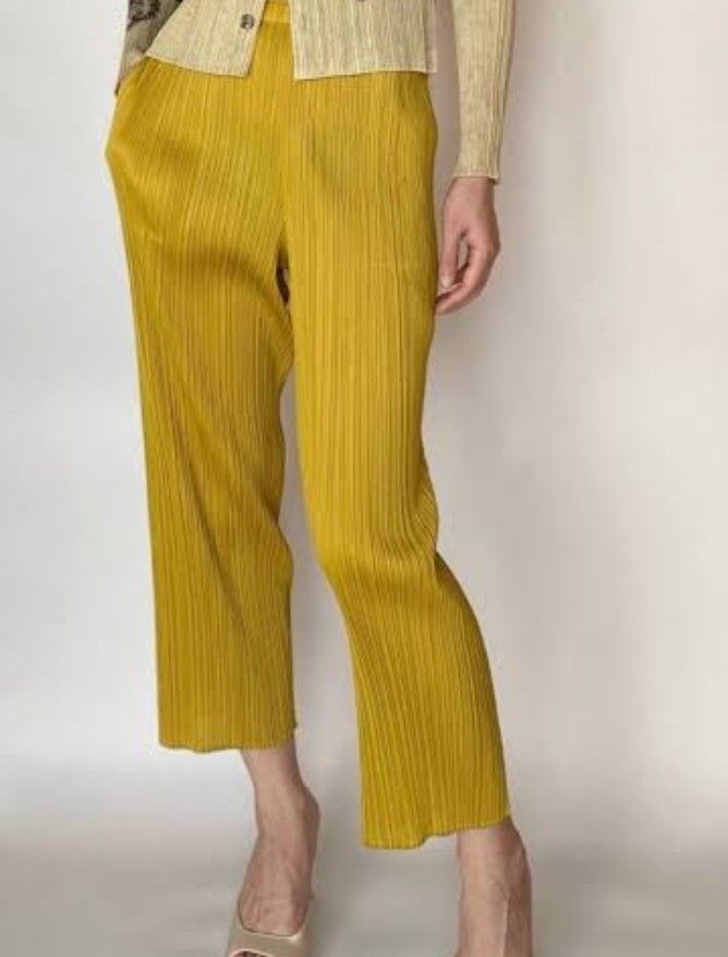 Authentic Issey miyake saffron pleated wide pants (Category: Other Bottoms) located in Donsol. Submitted by saksthriftavenuebyluckymaria8 (Listing ID 1352186626, Image 2). Description: Fits ALL WAIST up to 20in LENGTH 35.5in INSEAM 24in CROTCH 12in EXCELLENT CONDITION STRETCHABLE MADE IN JAPAN Very expensive.