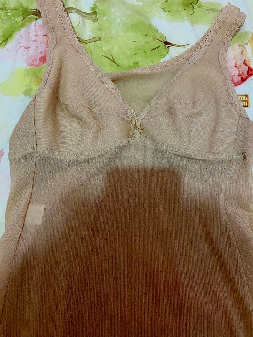 Beige bodycon/fitted dress (Category: Dresses) located in Cavite. Submitted by candykharma (Listing ID 1352229547, Image 2). Description: - never been used - best fit sizes medium- semi large - a see through dress so wear an inner or style it however u want! -still negotiable.