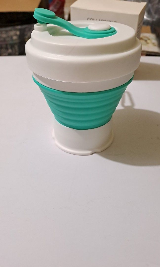 Collapsible portable silicone cup (Category: Dinnerware & Cutlery) located in Manila. Submitted by daisythejane (Listing ID 1352275283, Image 2). Description: Brand new silicone collapsible cup with drinking lid ✅️BPA free ✅️Leak proof ✅️Portable with carabiner included ✅️Collapsible ✅️350ml capacity.