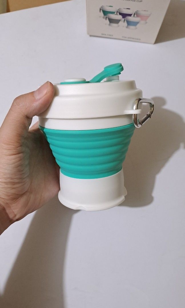 Collapsible portable silicone cup (Category: Dinnerware & Cutlery) located in Manila. Submitted by daisythejane (Listing ID 1352275283, Image 1). Description: Brand new silicone collapsible cup with drinking lid ✅️BPA free ✅️Leak proof ✅️Portable with carabiner included ✅️Collapsible ✅️350ml capacity.