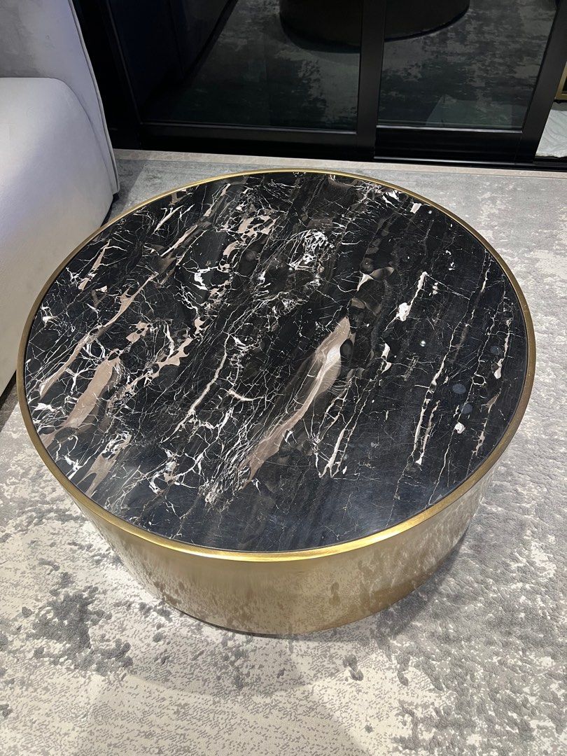 Exquisite solid marble coffee table (Category: Tables & Sets) located in Singapore. Submitted by jy_86 (Listing ID 1352261965, Image 1). Description: Solid marble coffee table for sale. Bought 1 year ago, like new. Selling because I am moving house. As it is made of solid marble, the table is very heavy. Self arrange collection/delivery would be required.Dimension: circular table top, diameter 32.3 inch (83cm); height 15 inch (38cm)..