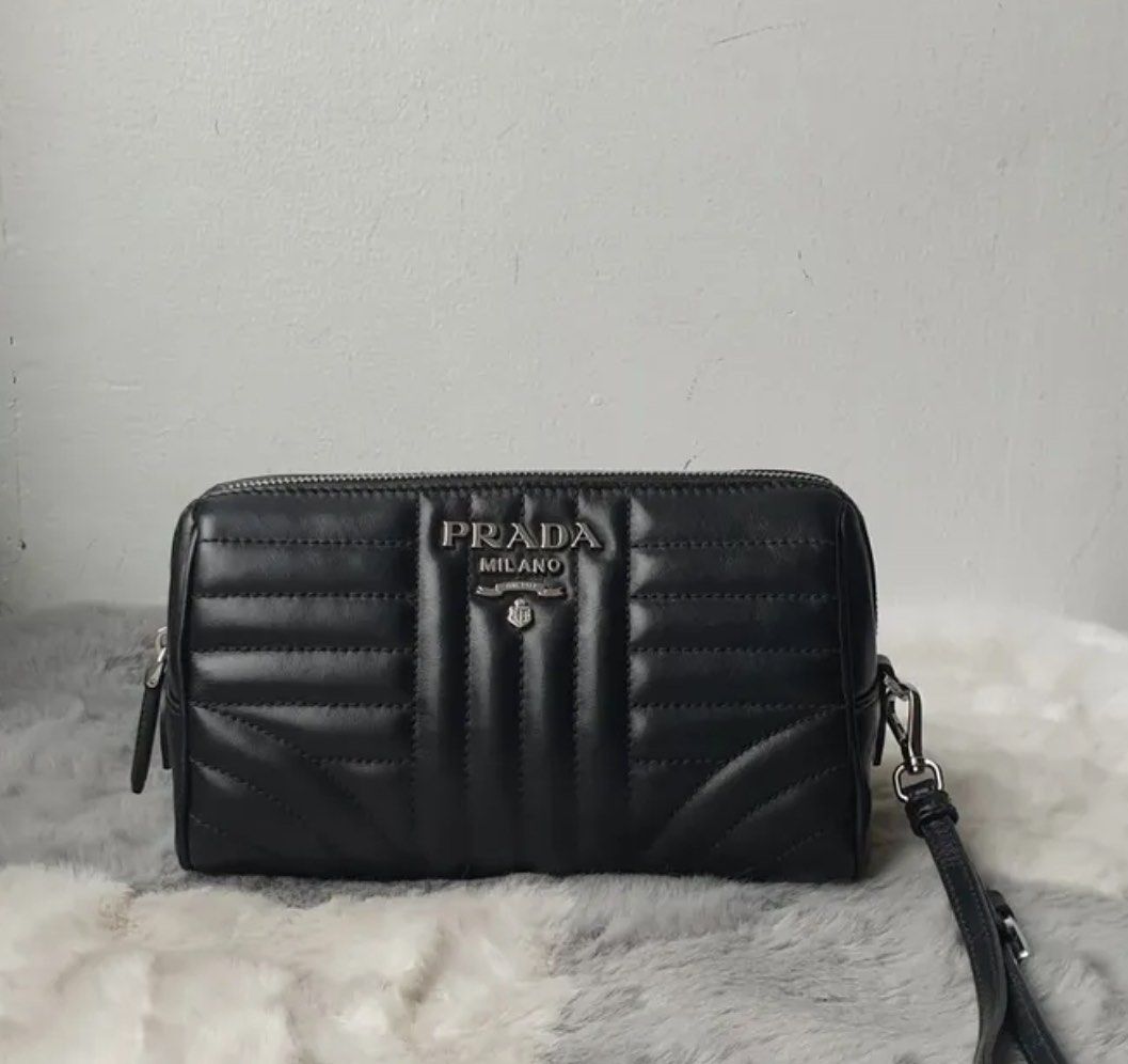 Like new Prada pouch can put sling chain (Category: Luxury Bags & Wallets) located in Santa Ana. Submitted by astonandariana (Listing ID 1352330597, Image 1). Description: .