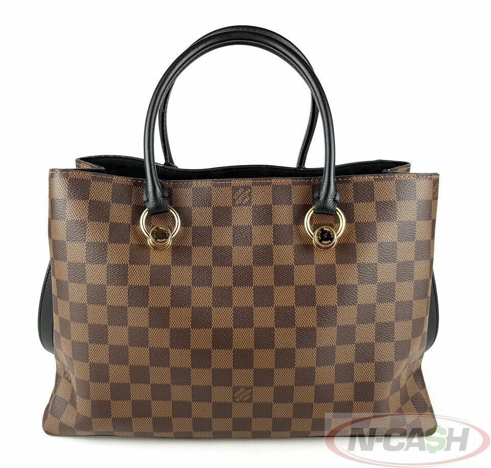 Louis Vuitton Riverside Damier Ebene Canvas (Category: Luxury Bags & Wallets) located in Quezon City. Submitted by luxury_by_n-cash (Listing ID 1352284980, Image 2). Description: N-Cash Pawnshop "Instant Cash for Bags, Watches, Cars, and Electronics" https://www.ncash-pawnshop-philippines.com/ Louis Vuitton Riverside Damier Ebene Canvas PRE-OWNED Brand: LOUIS VUITTON Measures: 14.25″ L (at base) x 9.5″ H x 5″ D (approx) 5″ Double Handle Drop 16.7