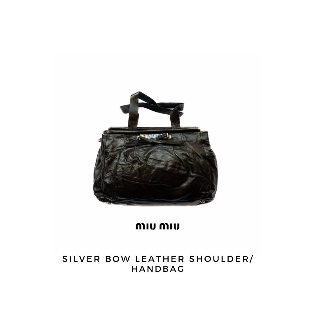 Miu Miu silver bow leather bag (Category: Luxury Bags & Wallets) located in Makati City. Submitted by ellope (Listing ID 1352040553, Image 1). Description: Miu Miu silver bow leather shoulder/handbag silver hardware Buttons on the side to make the bag bigger/smaller 1 zipper inside pocket, 2 inside pocket Newly conditioned LasPiñas loc issue: missing strap.