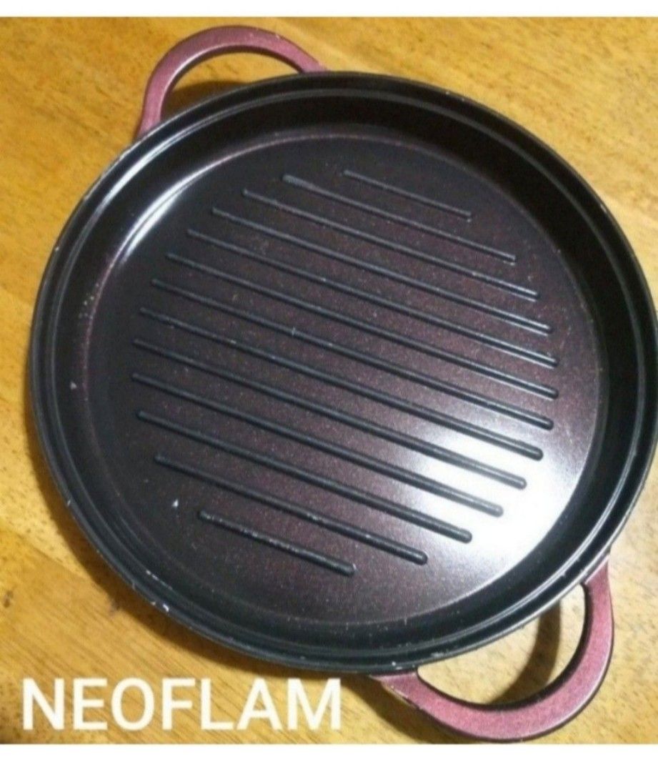 NEOFLAM GRILL PAN (Category: Cookware & Accessories) located in Rizal. Submitted by baltiq (Listing ID 1352168654, Image 1). Description: NEOFLAM Jewel Retro Grill Pan ✔️gas stove only NON-INDUCTION ✔️nonstick coating ✔️major feature: NON-TOXIC kahit magbakbak or gasgas ang coating ✔️purple red color, 11in.dm. ✔️jewel model - shimmery design; actual pic ✔️dishwasher, oven safe ✔️from Korea, barely used, just stored ✔️see, zoom in pics for scratch
