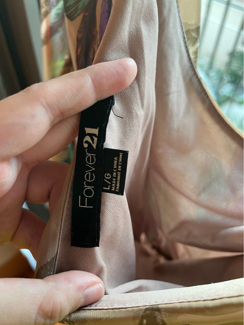 ONE SHOULDER MINI DRESS (Category: Dresses) located in Makati City. Submitted by messbless (Listing ID 1352276934, Image 3). Description: - Hanger straps are broken - Breezy material - Price is negotiable - Delivery and booking care of buyer.