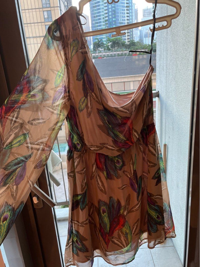 ONE SHOULDER MINI DRESS (Category: Dresses) located in Makati City. Submitted by messbless (Listing ID 1352276934, Image 1). Description: - Hanger straps are broken - Breezy material - Price is negotiable - Delivery and booking care of buyer.