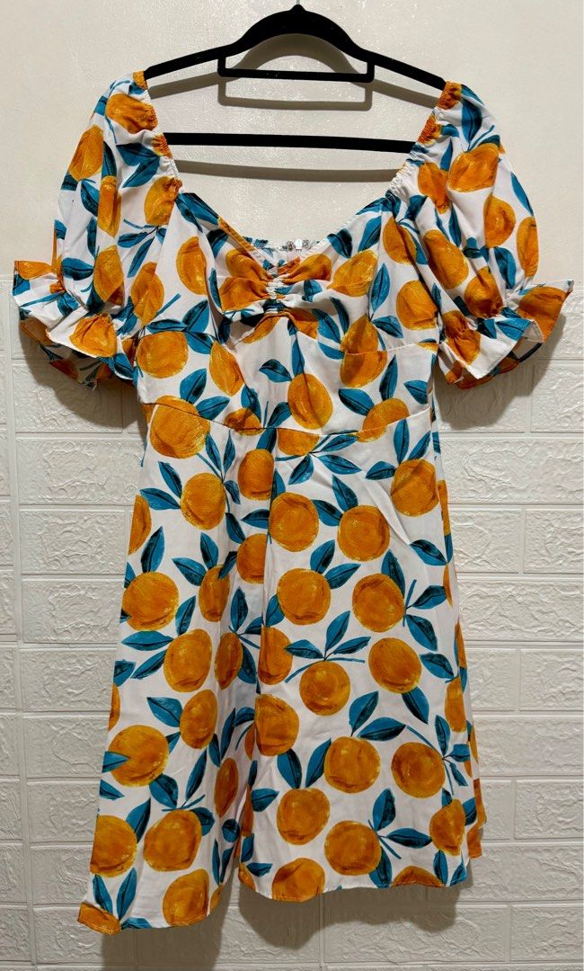 ORANGE PRINT PUFF SLEEVE DRESS (Category: Dresses) located in Manila. Submitted by alybugarin_29 (Listing ID 1352160755, Image 1). Description: Used once Super nice dress.
