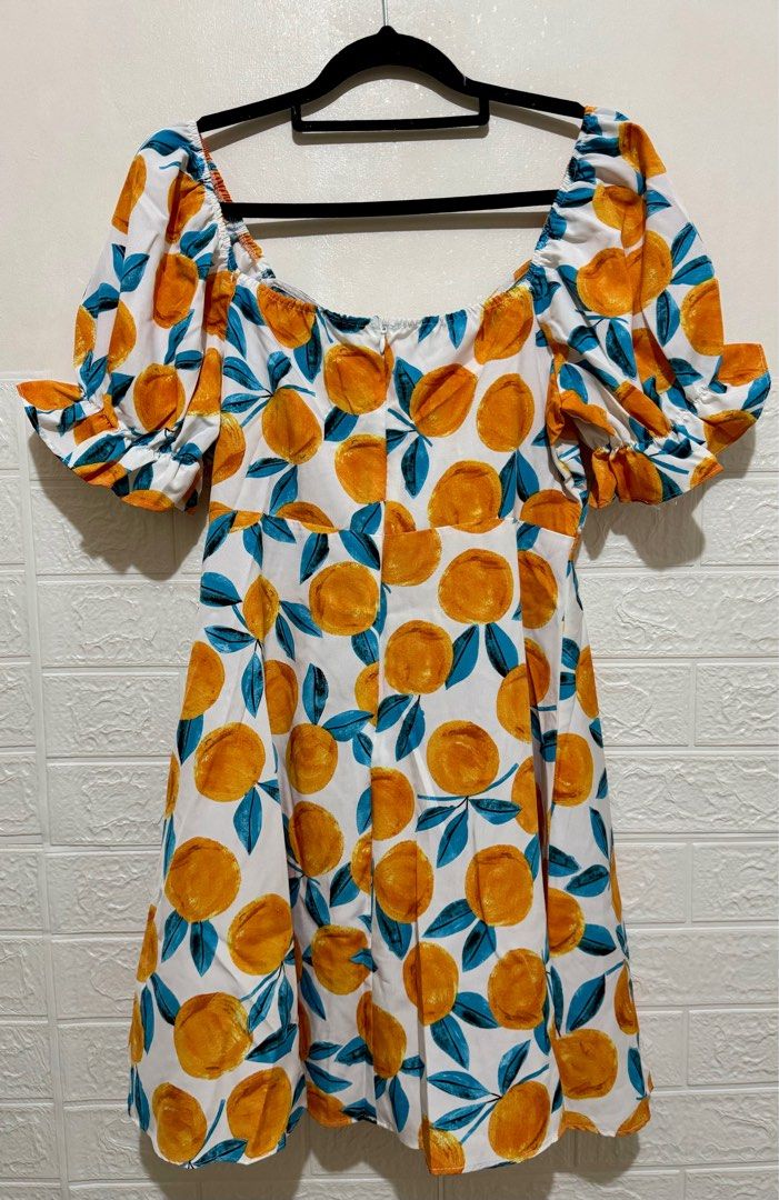 ORANGE PRINT PUFF SLEEVE DRESS (Category: Dresses) located in Manila. Submitted by alybugarin_29 (Listing ID 1352160755, Image 2). Description: Used once Super nice dress.