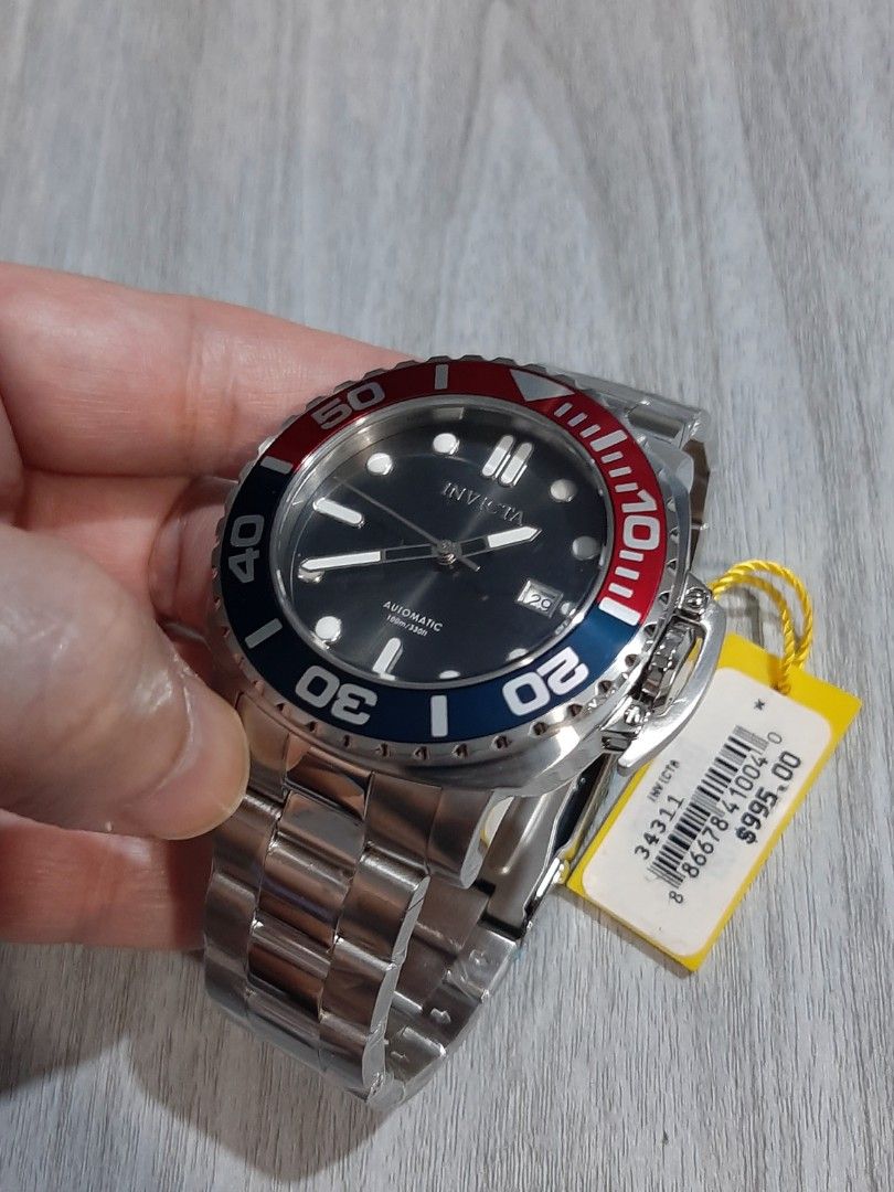 Original Invicta Pro Diver Automatic "PEPSI" (Category: Men's Watches) located in Mandaluyong City. Submitted by time_machine28 (Listing ID 1352217091, Image 2). Description: Ptpa, SALE...SALE...SALE... SALE...SALE...SALE... 8,600 pesos only Invicta Pro Diver Automatic Model 34311 Red/Blue Bezel Original/legit Brandnew Selling low Silver tone Charcoal dial Fit's up to 8 inches wrist Bought in u.s Men's Size 48mm 09173459191 Mandaluyong here Mop:B