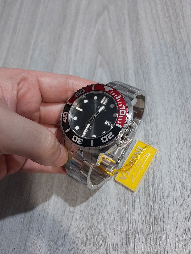 Original Invicta Pro Diver Automatic Model 34314 (Category: Men's Watches) located in Mandaluyong City. Submitted by time_machine28 (Listing ID 1352224382, Image 2). Description: Ptpa, SALE...SALE...SALE... SALE...SALE...SALE... 8,600 pesos only Invicta Pro Diver Automatic Model 34314 Red/Black Bezel Original/legit Brandnew Selling low Silver tone Charcoal dial Fit's up to 8 inches wrist Bought in u.s Men's Size 48mm 09173459191 Mandaluyong here 