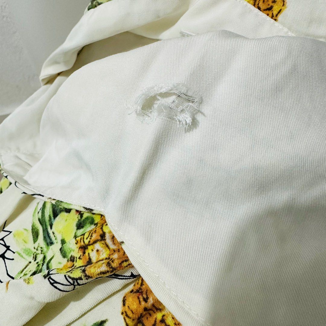 Pineapple Summer Dress (Category: Dresses) located in Calamba. Submitted by zybellezone (Listing ID 1352260509, Image 3). Description: Fits medium to large Criss cross back Double lining Minor flaw: hole in the inner lining, not seen when worn since it is inside.