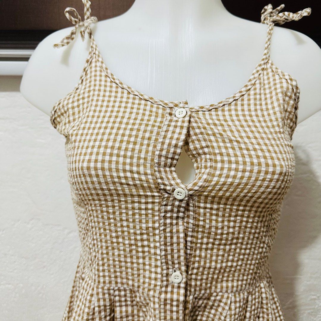 Plaid Checkered Brown Button Down Dress (Category: Dresses) located in Calamba. Submitted by zybellezone (Listing ID 1352257671, Image 2). Description: Fits small to semi med Ideal for flat chested ladies.