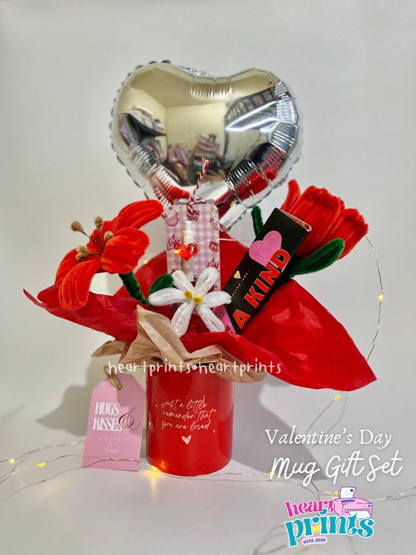 Valentine's Day Mug Gift Set (Category: Coffee & Tea Tableware) located in Manila. Submitted by heartprints (Listing ID 1352282652, Image 2). Description: Inclusion: 1 11oz mug (can customized) 2 stem fuzzy wire flower 1 hersheys chocolate with personalized wrapper 1 3pcs ferrero 1 10inch heart balloon 1 bookmark x pen 1 valentines tag DM for inquiries .