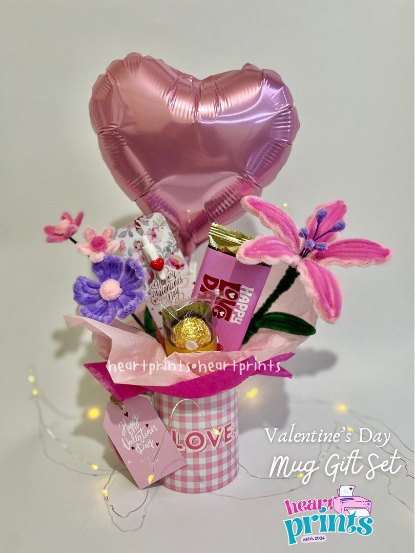 Valentine's Day Mug Gift Set (Category: Coffee & Tea Tableware) located in Manila. Submitted by heartprints (Listing ID 1352282652, Image 1). Description: Inclusion: 1 11oz mug (can customized) 2 stem fuzzy wire flower 1 hersheys chocolate with personalized wrapper 1 3pcs ferrero 1 10inch heart balloon 1 bookmark x pen 1 valentines tag DM for inquiries .