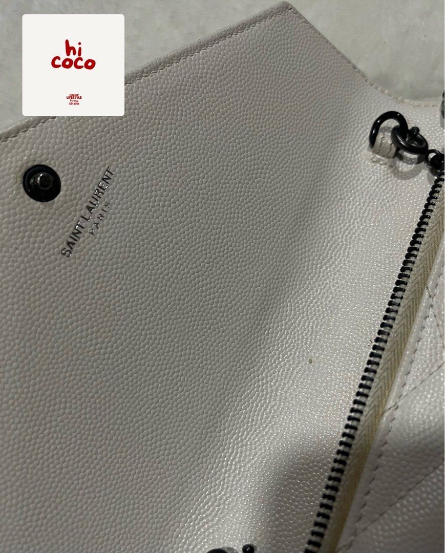 YSL Two way White Caviar (Category: Luxury Bags & Wallets) located in Bulacan. Submitted by hicoco.ph (Listing ID 1352263637, Image 3). Description: Negotiable Personal owned bought from Japan Authenticated Willing to see first PM me.