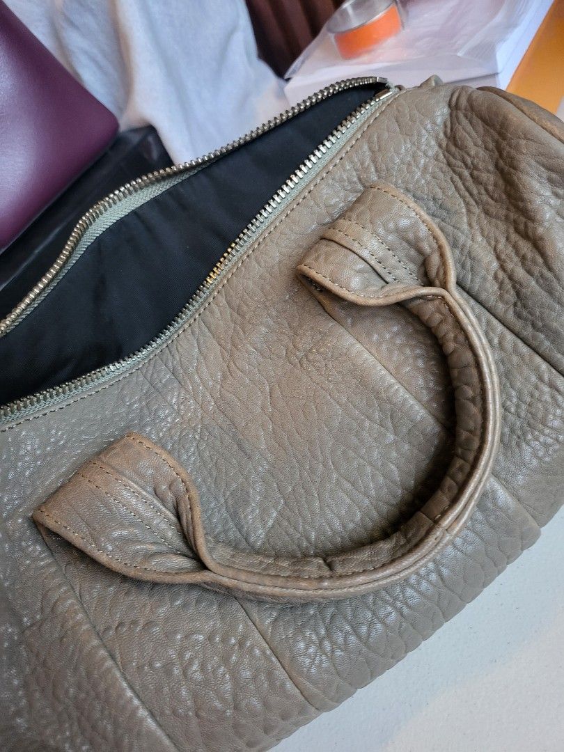 Alexander Wang Rocco Bag (Category: Luxury Bags & Wallets) located in Manila. Submitted by camar195 (Listing ID 1352493407, Image 3). Description: Alexander Wang Rocco Bag Inclusion: Strap Card Description: Normal Wear on leather Scratches on bottom metal studs No rips or tears No foul smell *All items are authentic PM for inquiries *Shipping and delivery c/o the buyer *Meet-up for serious buyers only (PM us for location).