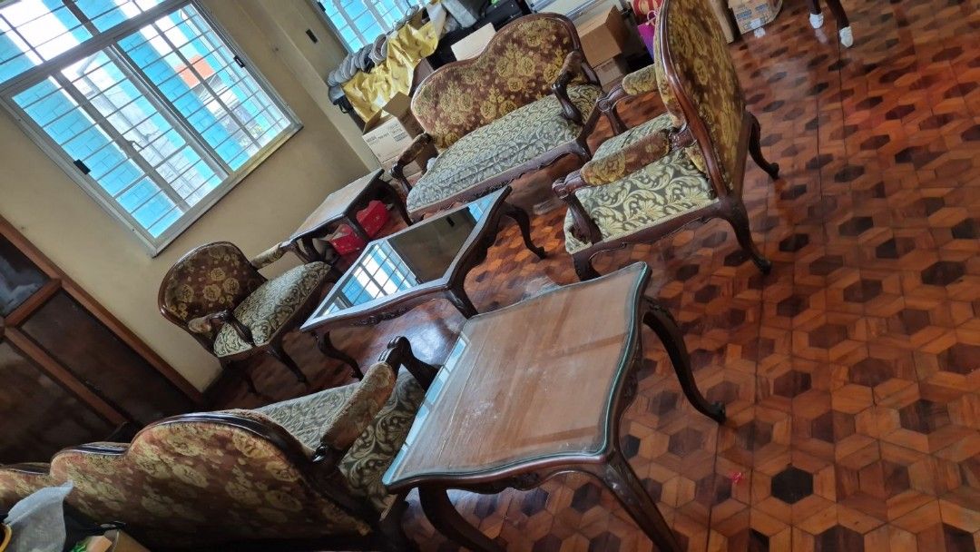 Antique narra framed sofa center and side tables (Category: Sofas) located in Caloocan City. Submitted by cleanup_clutter (Listing ID 1352363050, Image 1). Description: much loved antiques 3 seater sofa, 2 seater love seat, 2 single seater with arms, center table with glass top and 2 side tables, Narra material and covered in vintage upholstery. call if interested. Owner moving to condominium.