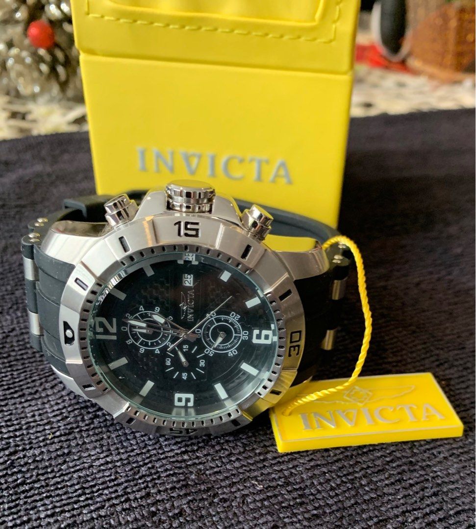 AUTH INVICTA Pro Diver SCUBA mode 24962 (Category: Men's Watches) located in Las Pinas. Submitted by karinaso (Listing ID 1352349396, Image 3). Description: Selling my dad’s Invicta Watch - Dive Tested. Used once. - Case Size: 50mm - Case Material: S.Steel - Bezel Color: Black, Silver Crown Type: Push - Crystal Type: Flame Fusion Dial Material: Carbon Fiber - Water resistance 100M - TRITNITE Night Glow.