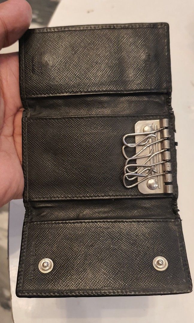 Authentic prada keyholder (Category: Luxury Bags & Wallets) located in Cavite. Submitted by ohmie23 (Listing ID 1352506057, Image 2). Description: Authentic prada keyholder.