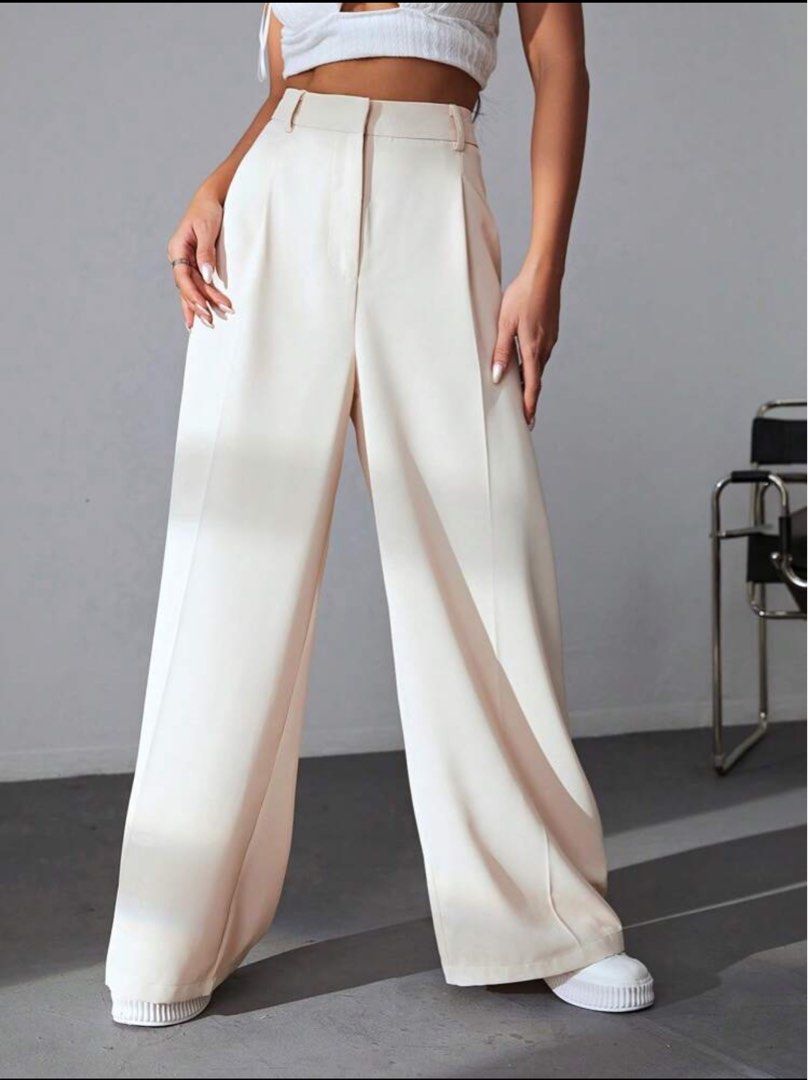 B1T1 Wide Leg Trousers (Category: Other Bottoms) located in Quezon City. Submitted by declutterwithme11_ (Listing ID 1352434267, Image 2). Description: Never worn. 2 for 800 pesos only Brand new condition. Waistline: 30-32.