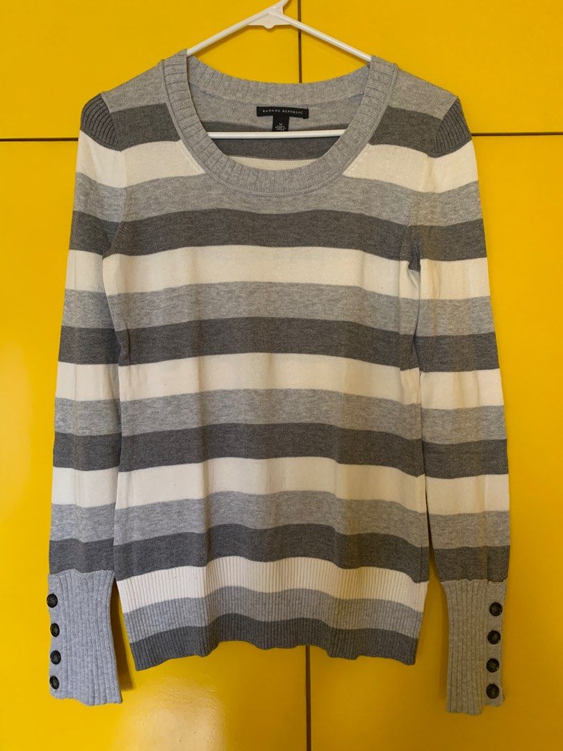 BANANA REPUBLIC Gray Striped Sweater (Category: Longsleeves) located in Marikina City. Submitted by raiafr (Listing ID 1352381928, Image 1). Description: Gray striped sweater from Banana Republic. Size M. Excellent quality, used it for our winter travels. Very comfy sweater. Selling because I'm size L now..