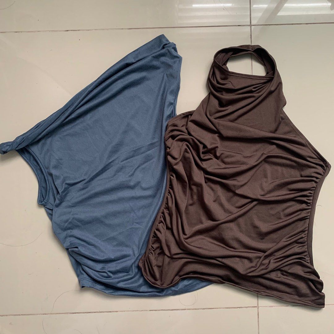 BSCO Brand New Tops Bundle (Category: Sleeveless) located in Dasmarinas. Submitted by asilochelsea (Listing ID 1352374172, Image 3). Description: BSCO Brand New Bundle Tops - Heidi Top (Asymmetrical Top Blue) and Orsel Top (High Neck Halter Top Brown) - All brand new - RFS: Not my size - Bundle, you can get it for only 300 both! - Can lower the price if sure buyer! .