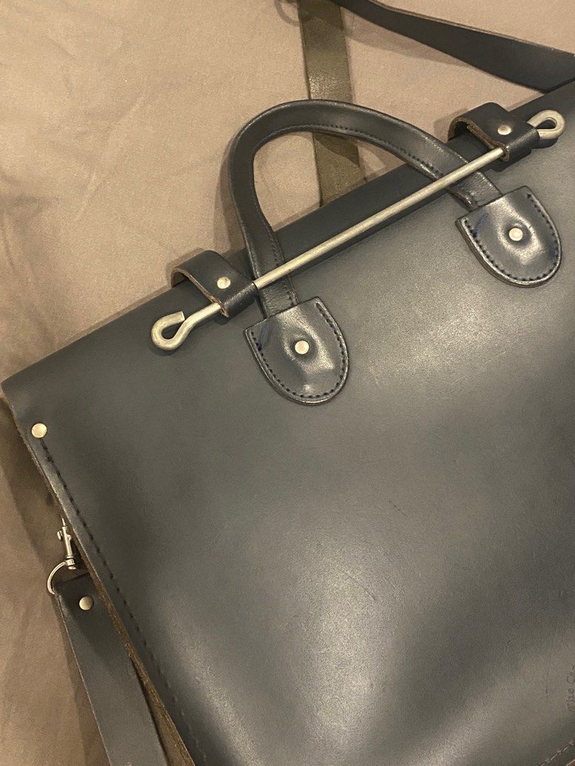 Cambridge Satchel Music Case (Category: Luxury Bags & Wallets) located in Paranaque City. Submitted by migmen (Listing ID 1352509951, Image 1). Description: Handcrafted leather bag features a distinctive bar closure and is designed to carry documents or a laptop. Size: See Last Pic Color: Navy Blue.
