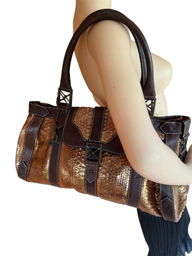 christian louboutin (Category: Luxury Bags & Wallets) located in Lingayen. Submitted by lux_thrift (Listing ID 1352384326, Image 3). Description: SUPER SALE!! approximately 16 x 10 x 6.5 missing 15 rivets/studs, can be replace po(available on lzada) has a small tear on flap RARE PIECE .
