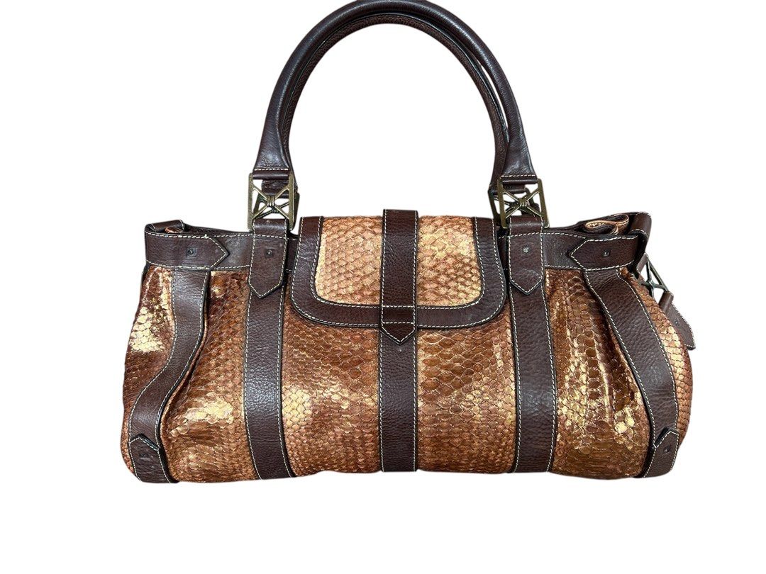 christian louboutin (Category: Luxury Bags & Wallets) located in Lingayen. Submitted by lux_thrift (Listing ID 1352384326, Image 2). Description: SUPER SALE!! approximately 16 x 10 x 6.5 missing 15 rivets/studs, can be replace po(available on lzada) has a small tear on flap RARE PIECE .