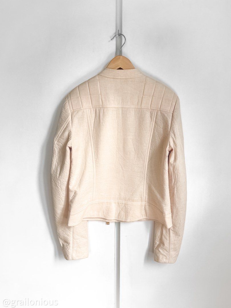 CLOSED Structured Muslin Biker/Cafe Racer | SAMPLE (Category: Coats, Jackets and Outerwear) located in Quezon City. Submitted by grailonious (Listing ID 1352460540, Image 3). Description: German quasi-luxury brand CLOSED, founded alongside Marithé et François Girbaud. Showroom sample. Muslin-texture cotton biker jacket in a nude/peach color. Textured cotton backed by some kind of neoprene/foam. Nice waffled padding design on the shoulders. Uses a