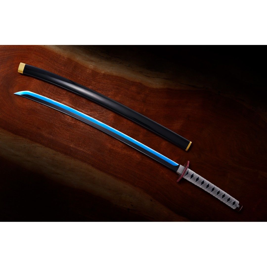 Demon Slayer Giyu Tomioka Nichirin Sword from Bandai (Category: J-Wave Merchandise) located in Singapore. Submitted by itswanted (Listing ID 1352437324, Image 1). Description: Brand new unopened in delivery box. Ordered directly from Bandai. Preordered from Bandai and waited for 6 months for it to be made and delivered. Limited edition..