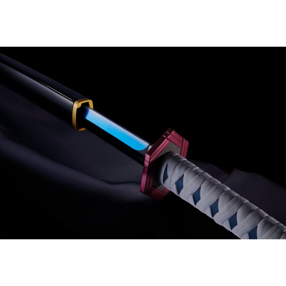 Demon Slayer Giyu Tomioka Nichirin Sword from Bandai (Category: J-Wave Merchandise) located in Singapore. Submitted by itswanted (Listing ID 1352437324, Image 2). Description: Brand new unopened in delivery box. Ordered directly from Bandai. Preordered from Bandai and waited for 6 months for it to be made and delivered. Limited edition..