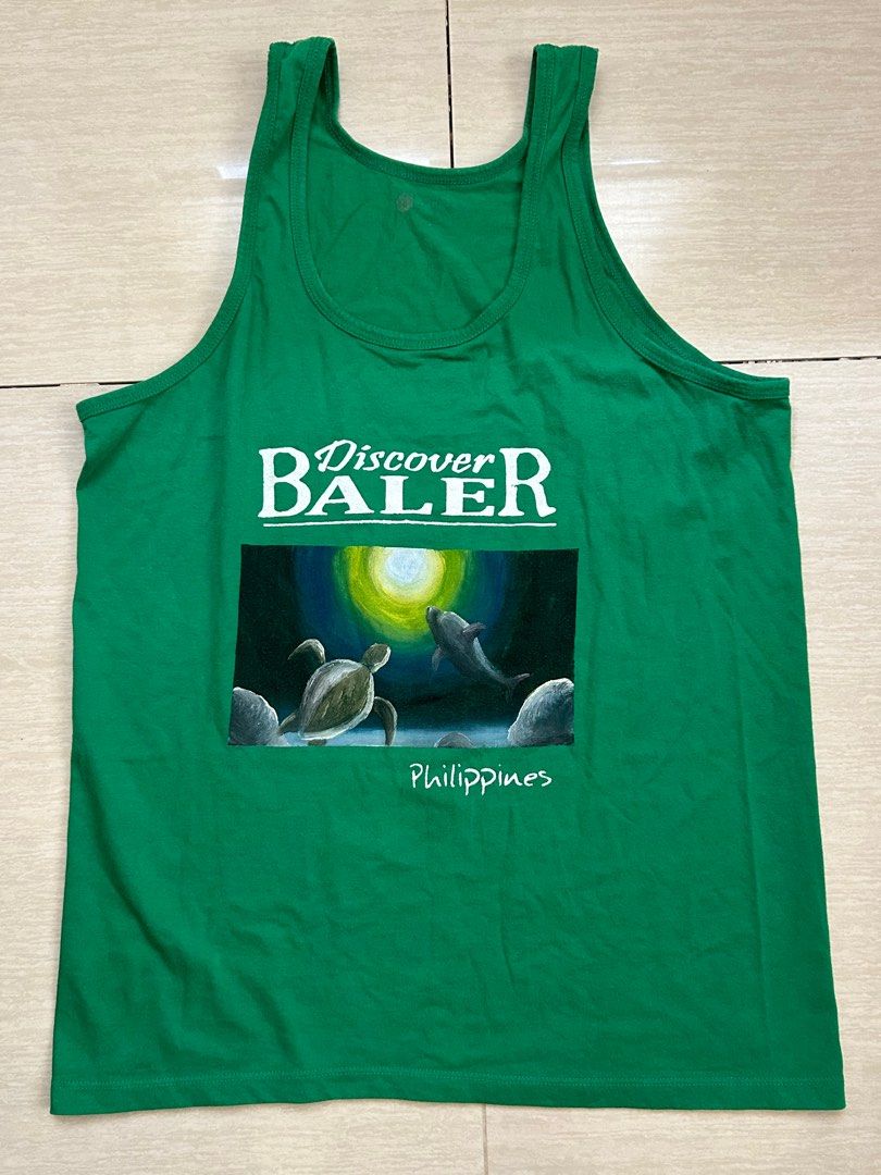 Green baler artwork beach tank sando top (Category: Swim Top & Rash Guards) located in Makati City. Submitted by longflighty (Listing ID 1352400779, Image 1). Description: no flaw No when worn Dimensions: W 18” L 26” On-hand and ready to ship Payment first basis MOP: Gcash/Seabank/BPI MOD: J&T and Lalamove (buyer shoulders the sf).