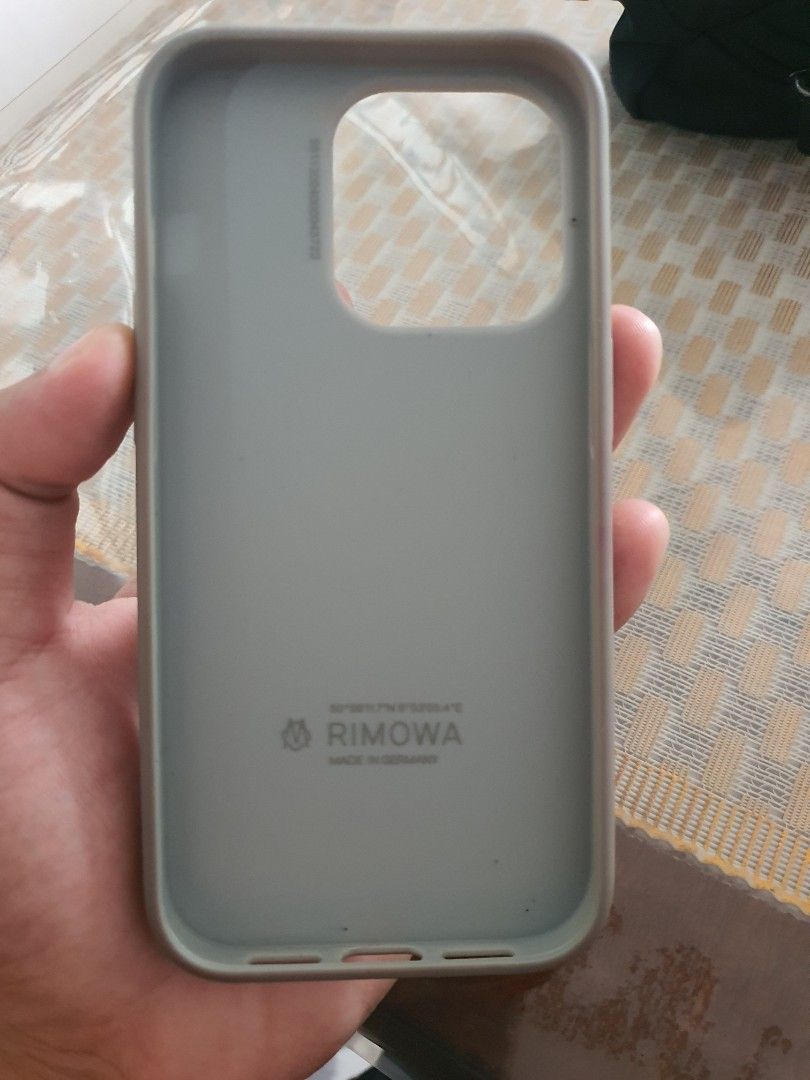 iPhone 14 Pro Rimowa Case (Category: Cases & Sleeves) located in Manila. Submitted by mobilelegendsmythic (Listing ID 1352437274, Image 2). Description: Used not abuse Detailed pic nasa post Rimowa case with serial Iphone 14 Pro.