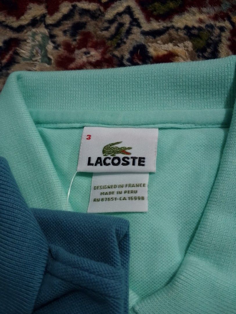 Lacoste Polo Shirt (Category: Tshirts & Polo Shirts ) located in Manila. Submitted by eyebeee (Listing ID 1352369257, Image 3). Description: 🐊CLASSIC Mens Polo Shirt 🐊 ☑️Cotton petit piqué (WILL NOT CHANGE SHAPE AND COLOR EVEN AFTER WASH) 🐊Classic Fit 🐊Design in France, Made in Peru 🐊With care tag & retail tag 🐊With Devanlay tag 🐊MEASUREMENTS: Size 1 – XXS Shoulder width: 15.5 inches Chest: 19 to 19.5 inches Length: 26 inches Size 2 – XS S