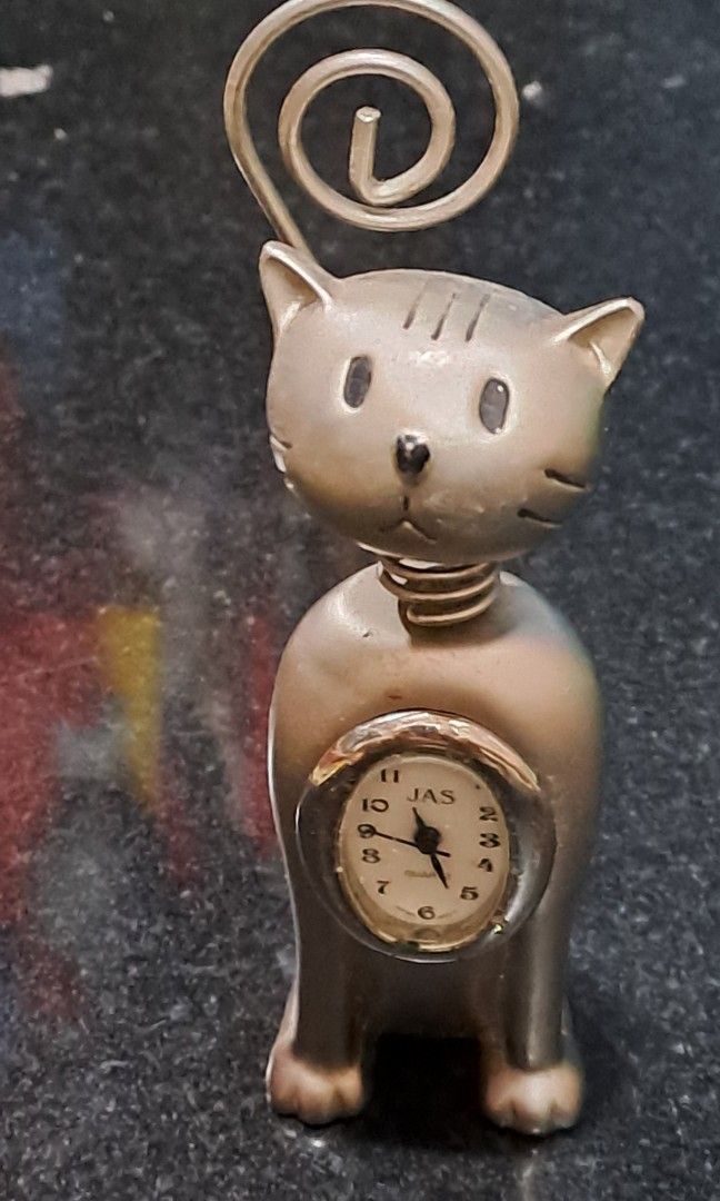 Miniature silver plated cat table clock (Category: Clocks) located in Davao. Submitted by bravemoon_556cd5 (Listing ID 1352491243, Image 3). Description: free sf we ship to gcash or bank account payment mode sale as is mo battery.