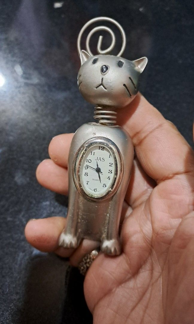 Miniature silver plated cat table clock (Category: Clocks) located in Davao. Submitted by bravemoon_556cd5 (Listing ID 1352491243, Image 1). Description: free sf we ship to gcash or bank account payment mode sale as is mo battery.
