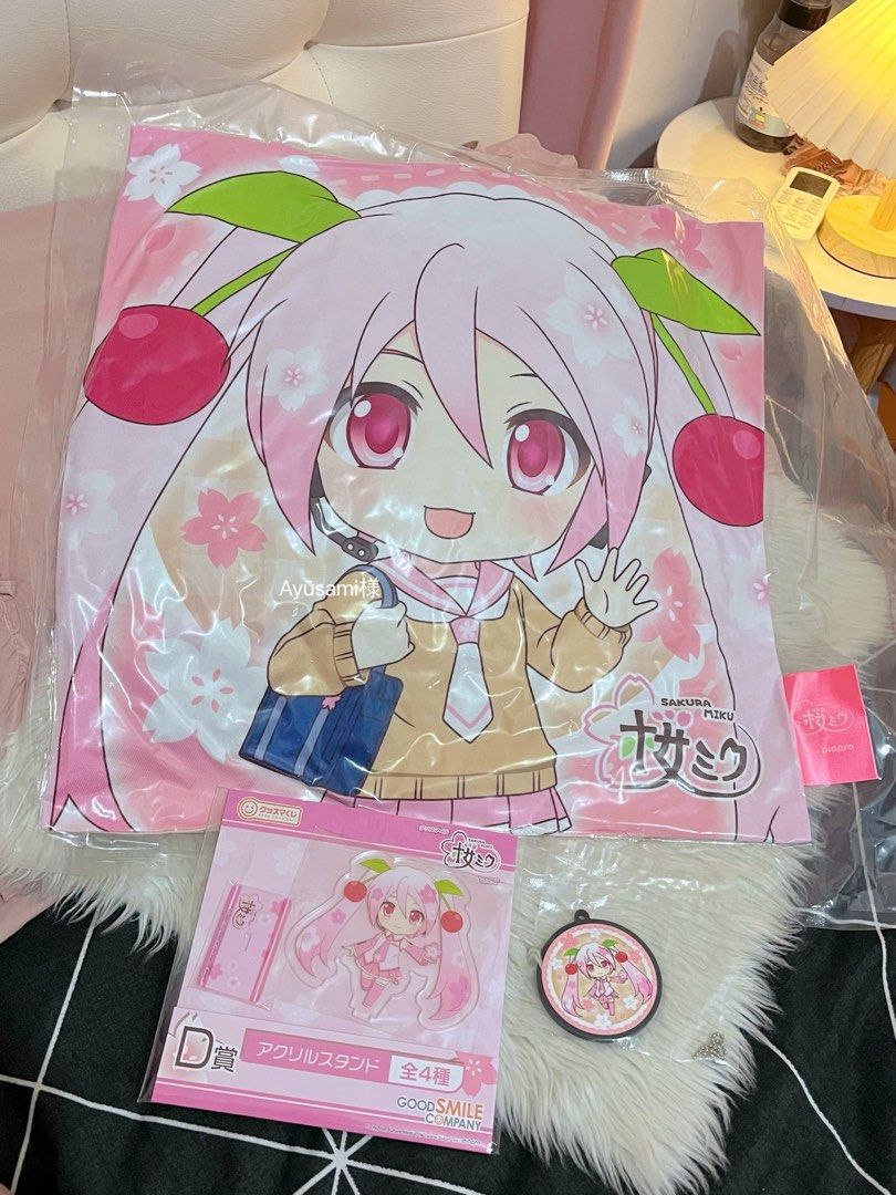 Sakura Hatsune Miku Bundle (Category: Character Goods) located in Subic. Submitted by ayusamicos (Listing ID 1352452001, Image 2). Description: 🌸 Sakura Hatsune Miku 💕 Fresh from Japan All authentic, brand new, & sealed > 1 pillow, 1 rubber keychain, 1 acrylic stand (random design will be sent) MOP: GCash. MOD: J&T Express. Sf will be shouldered by the buyer. .