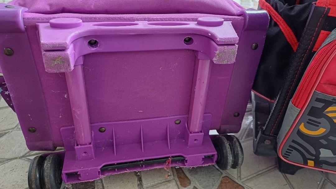 Trolley Bag Medium (Category: Babies & Kids Fashion) located in Quezon City. Submitted by luckgal (Listing ID 1352336325, Image 3). Description: pre loved. from SM frozen trolley bag. signs of use. all ingood conditon including wheels shipping via grab or lalamove at buyers expense..
