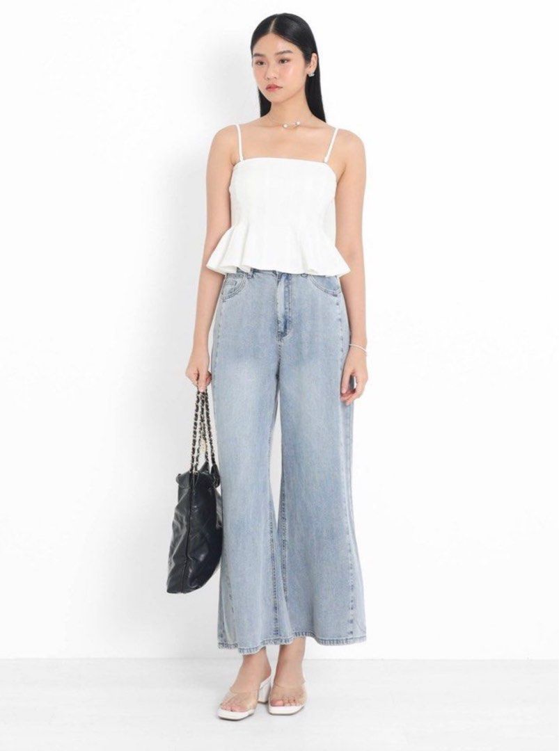 WTS TPZ PEAK SIDE (REGULAR) TENCEL JEAN IN LIGHT WASH (Category: Jeans & Leggings) located in Singapore. Submitted by __ddom__ (Listing ID 1352464276, Image 1). Description: BNWT selling at $40 Postage +$2.80 BNWT.