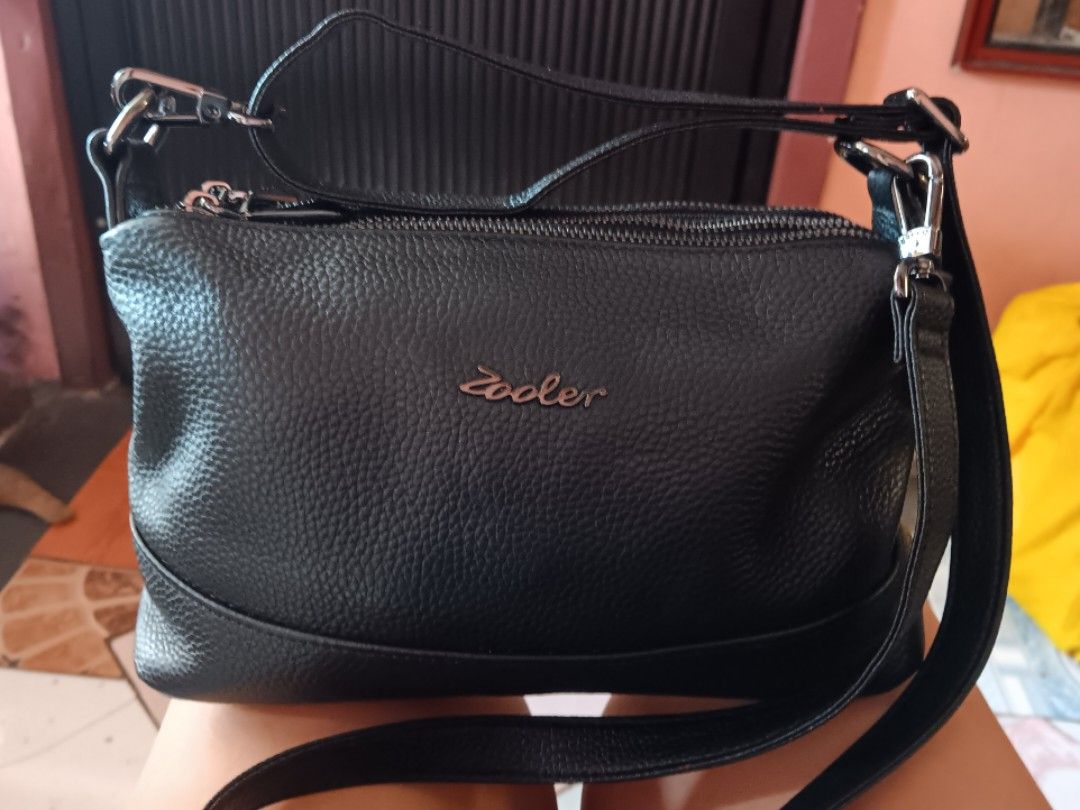 Zooler Genuine Leather Crossbody-Bag (Category: Luxury Bags & Wallets) located in Bacoor. Submitted by lhenz12 (Listing ID 1352366172, Image 1). Description: excellent condition, like new..