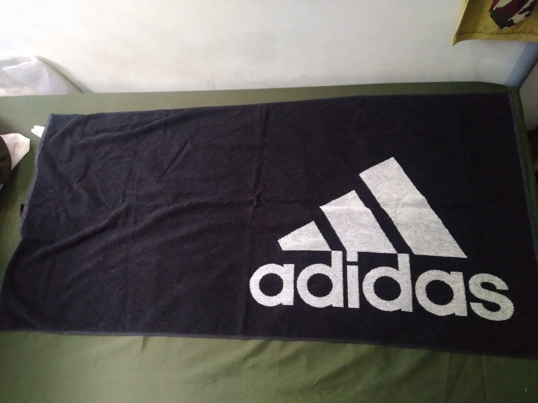 Adidas Bath Towel (DH2866) (Category: Bedding & Towels) located in Las Pinas. Submitted by willcatud (Listing ID 1352638553, Image 1). Description: FOR SALE Adidas Bath Towel (DH2866) SIZE: standard body towel size (26in x 52in) COLOR: black with white Adidas logo print - IN PRISTINE CONDITION - genuine Adidas product; bought at the official Adidas store on the orange app for php1600 (after vouchers) (see attached photo for proof) - money back gu
