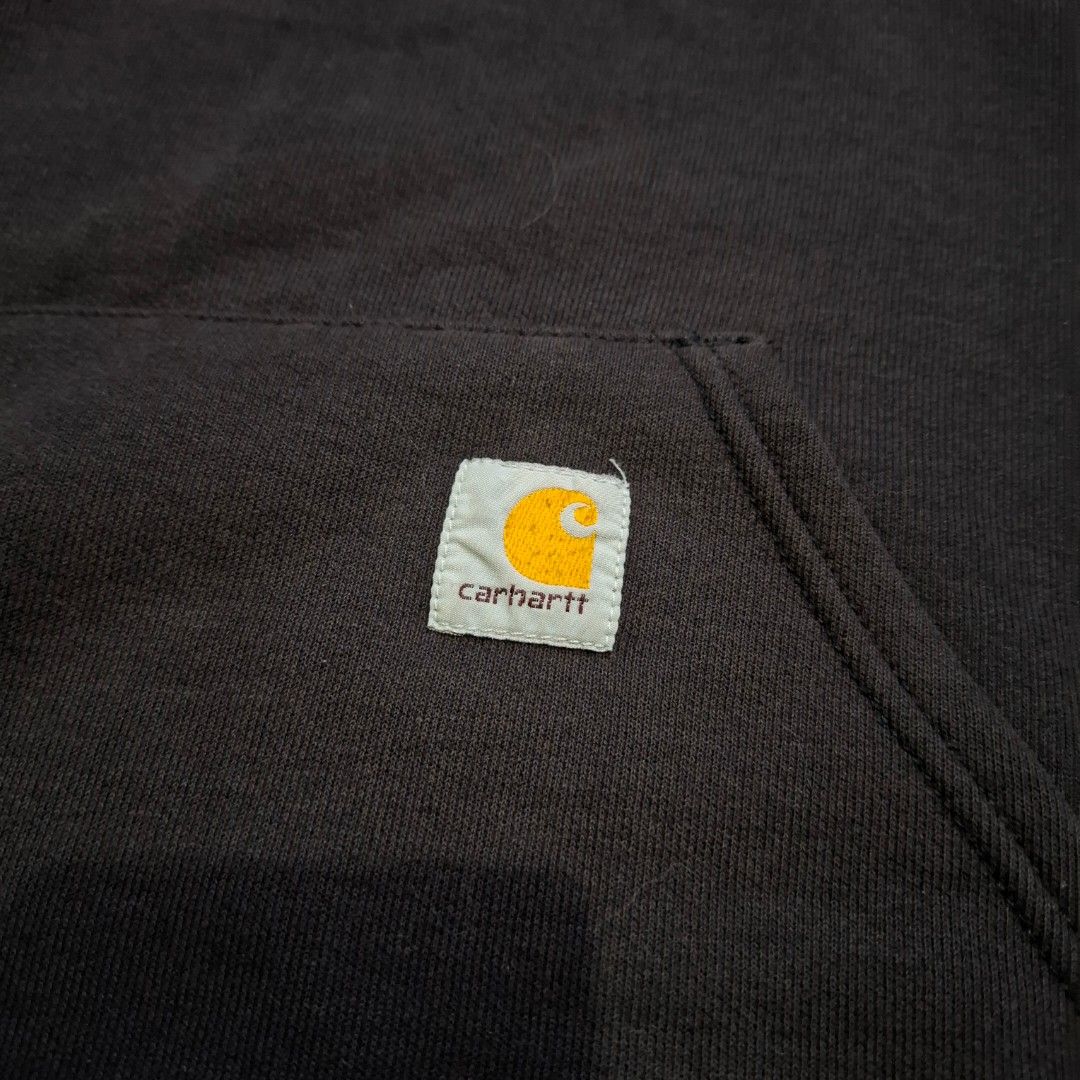 Carhartt 2XL black boxy pullover hoodie (Category: Coats, Jackets and Outerwear) located in Cainta. Submitted by soliven_ (Listing ID 1352534078, Image 2). Description: 2XL on tag Measurements (inches): Length 30 Width 30 condition: 8/10 — few unnoticeable pinholes. minor fade. scratch. oil stain (back part). ₱1.3k.
